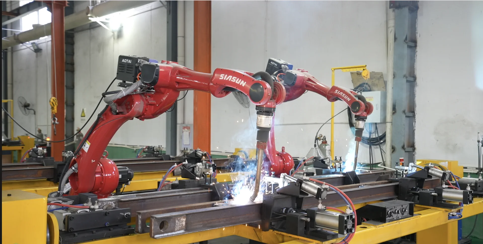Automated robotic welding process in the Hexin workshop